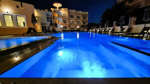 Outdoor pool, pool umbrellas, pool loungers