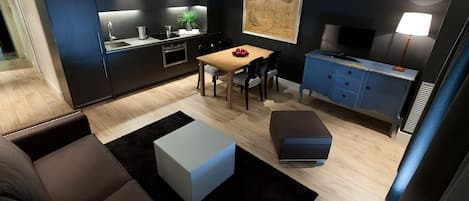 32-inch flat-screen TV with digital channels, TV, iPod dock