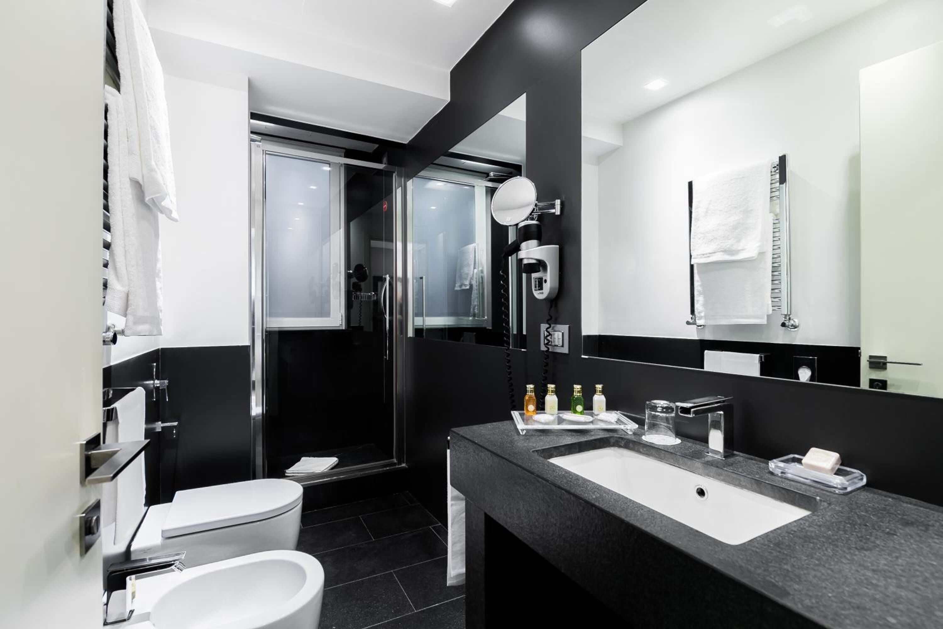 shower, rainfall showerhead, eco-friendly toiletries, slippers