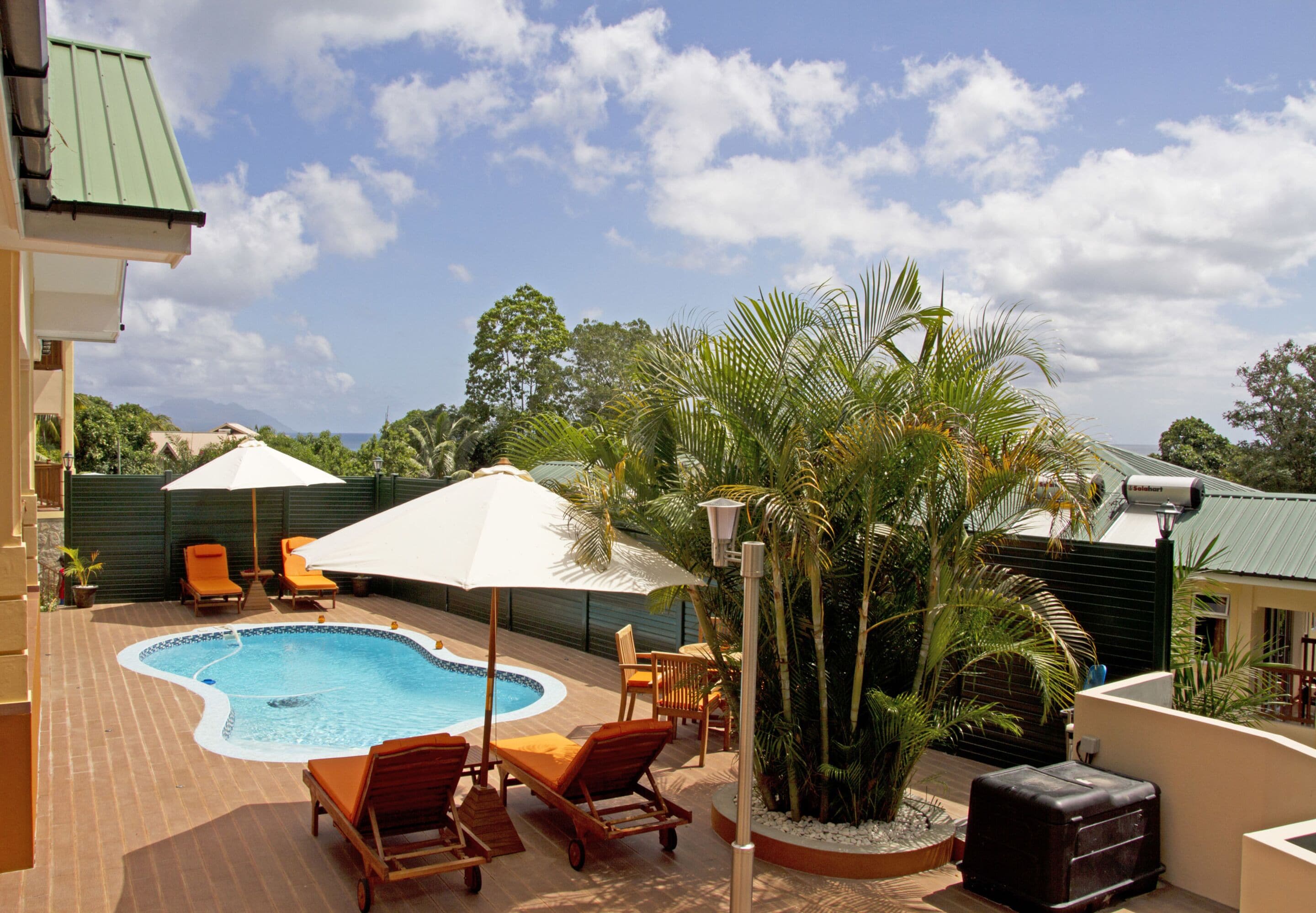 outdoor pool, pool umbrellas, pool loungers