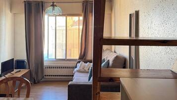 Studio | Coin séjour | Télévision