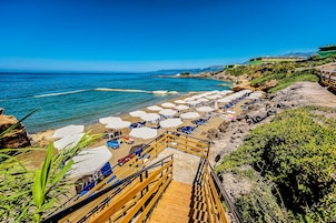 Private beach, sun loungers, beach umbrellas, beach towels