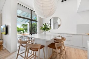 Executive Apartment | Living area | Flat-screen TV, DVD player - The Noosa Apartments (Noosa Heads)