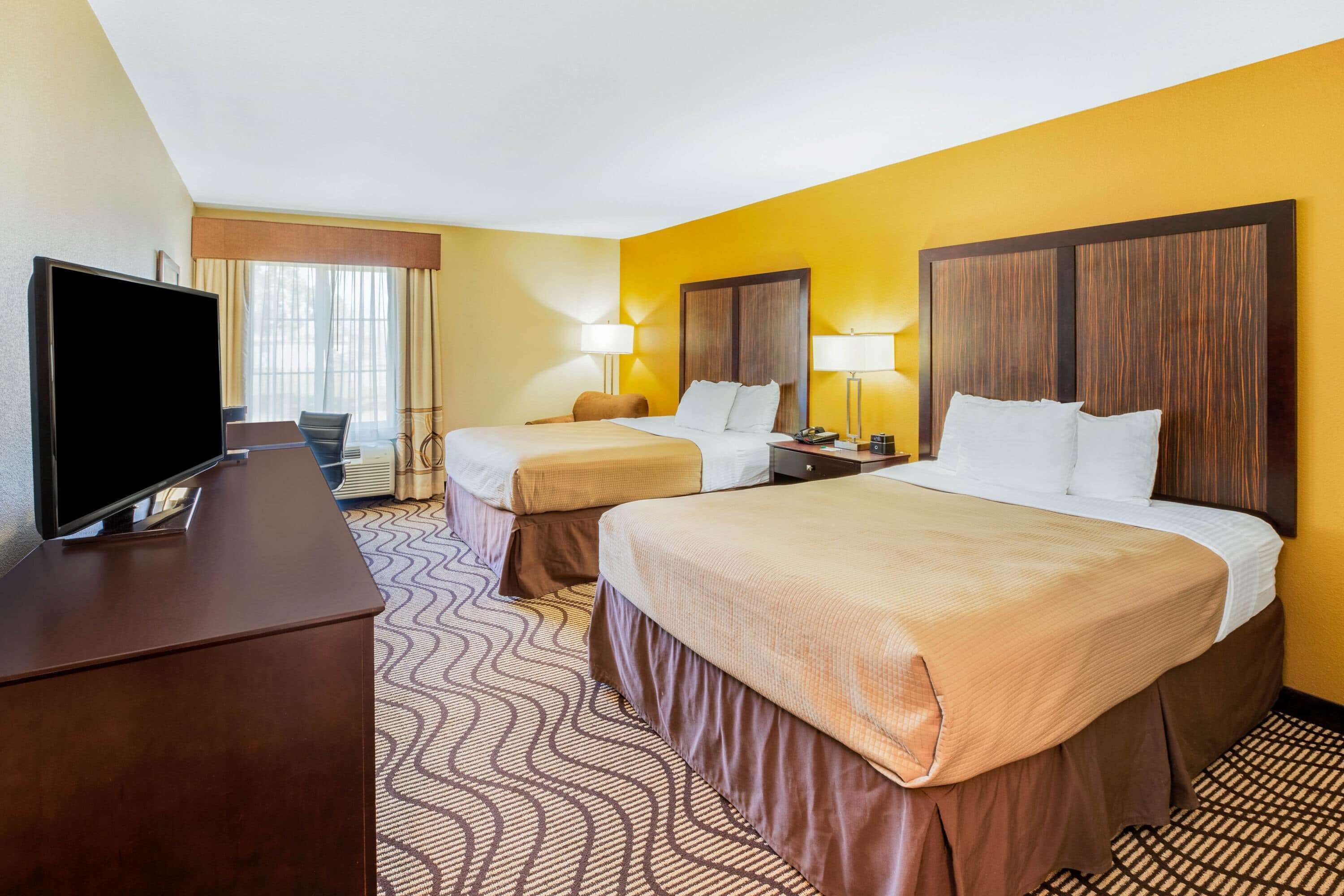 premium bedding, pillow-top beds, desk, iron/ironing board