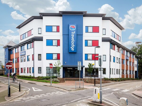 A Travelodge hotel with a modern design, featuring a prominent Travelodge sign on the facade. - Travelodge Woking Central (Woking)