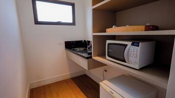 Superior Studio Suite, 1 King Bed, Balcony, City View | Private kitchen | Microwave, espresso maker, freezer