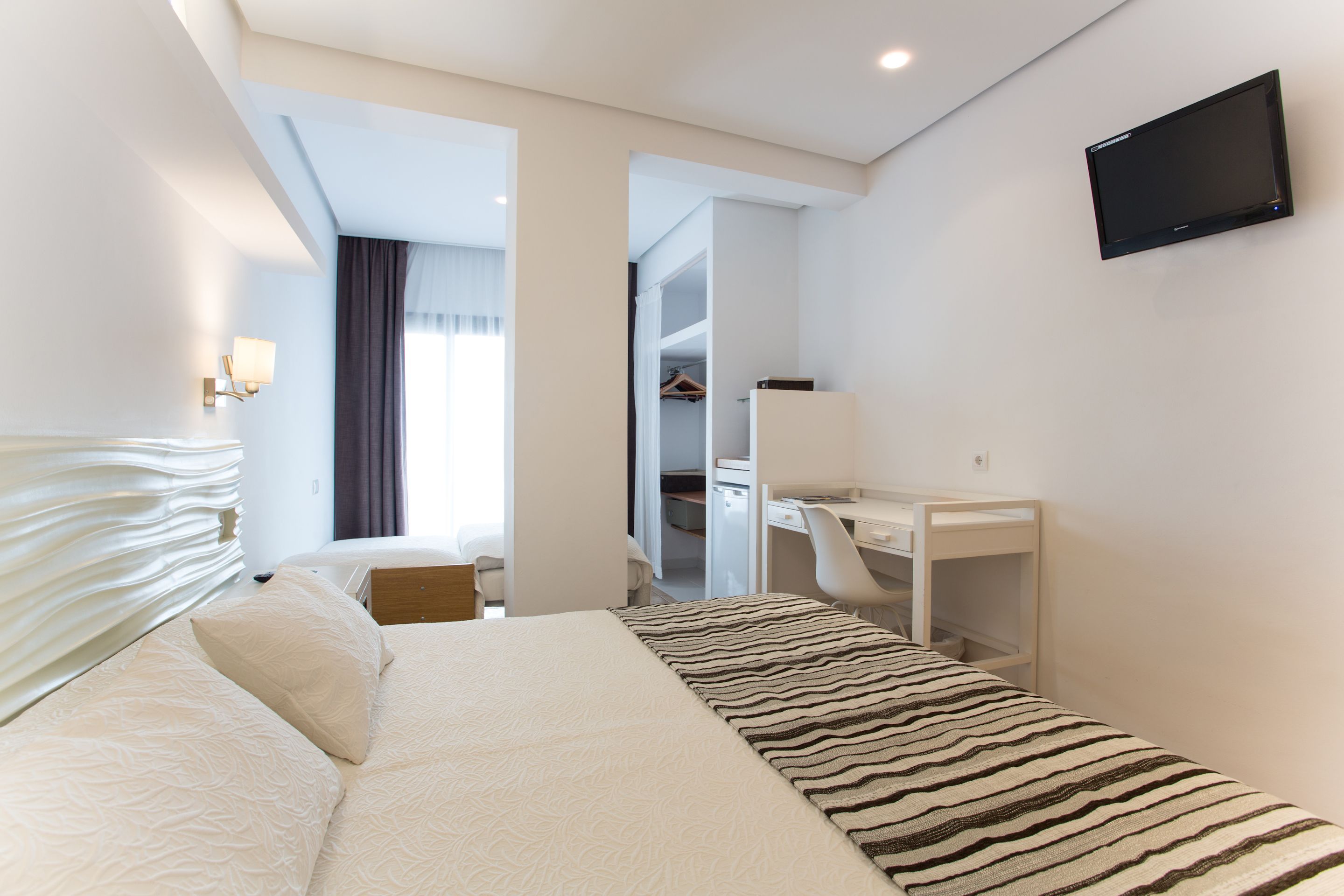 family double room | in-room safe, desk, laptop workspace, soundproofing