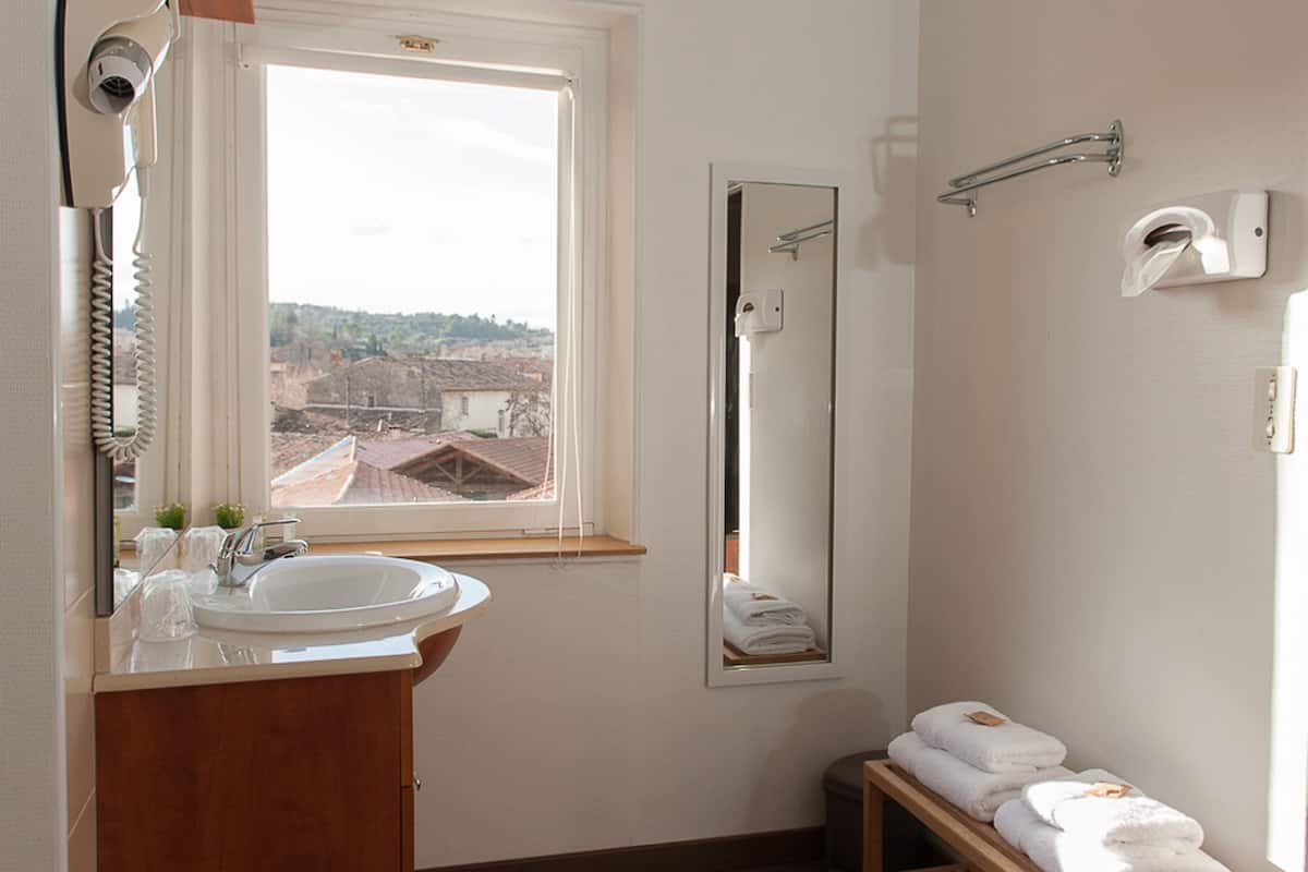 comfort triple room, 1 queen bed | bathroom | free toiletries, hair dryer, towels