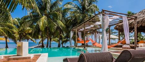 Outdoor pool, pool umbrellas, pool loungers