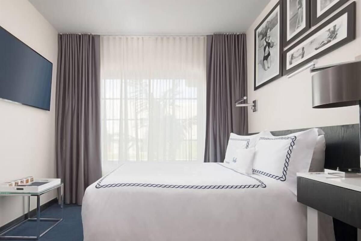 Premium bedding, pillow-top beds, in-room safe, blackout curtains