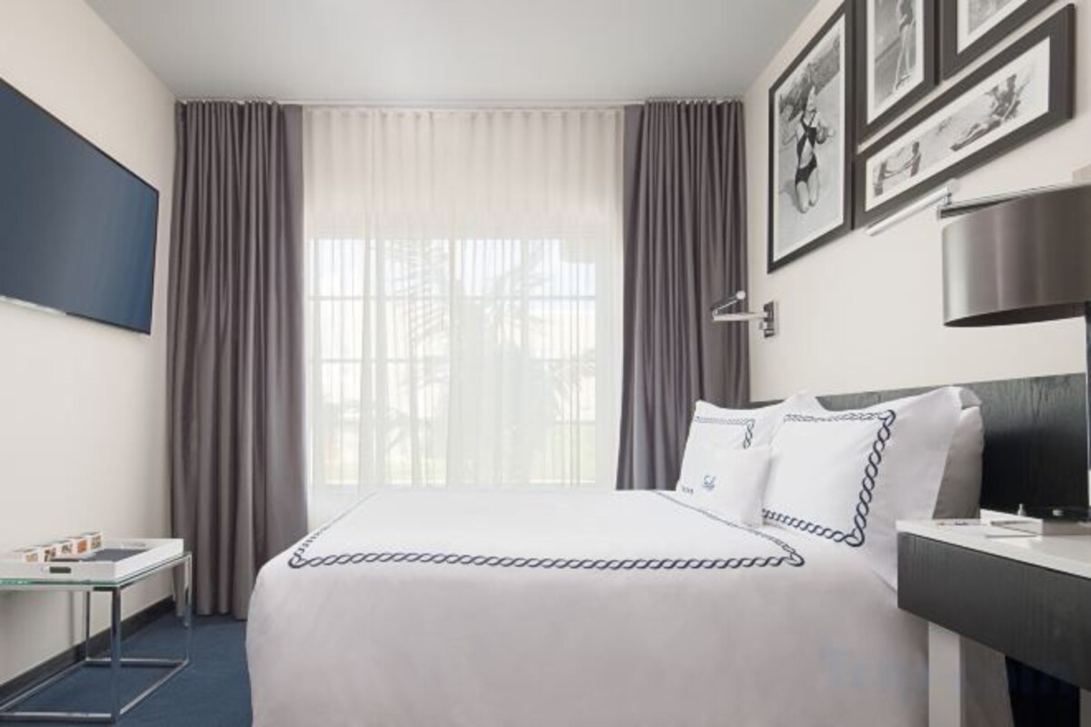 Premium bedding, pillow-top beds, in-room safe, blackout curtains