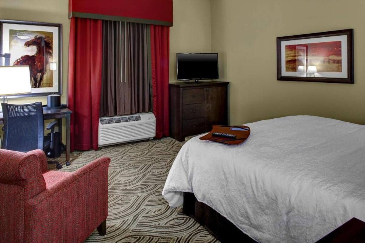 Hypo-allergenic bedding, pillowtop beds, desk, blackout drapes
