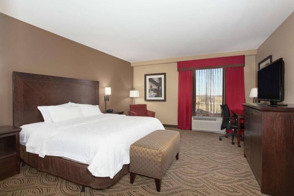 Hypo-allergenic bedding, pillowtop beds, desk, blackout drapes