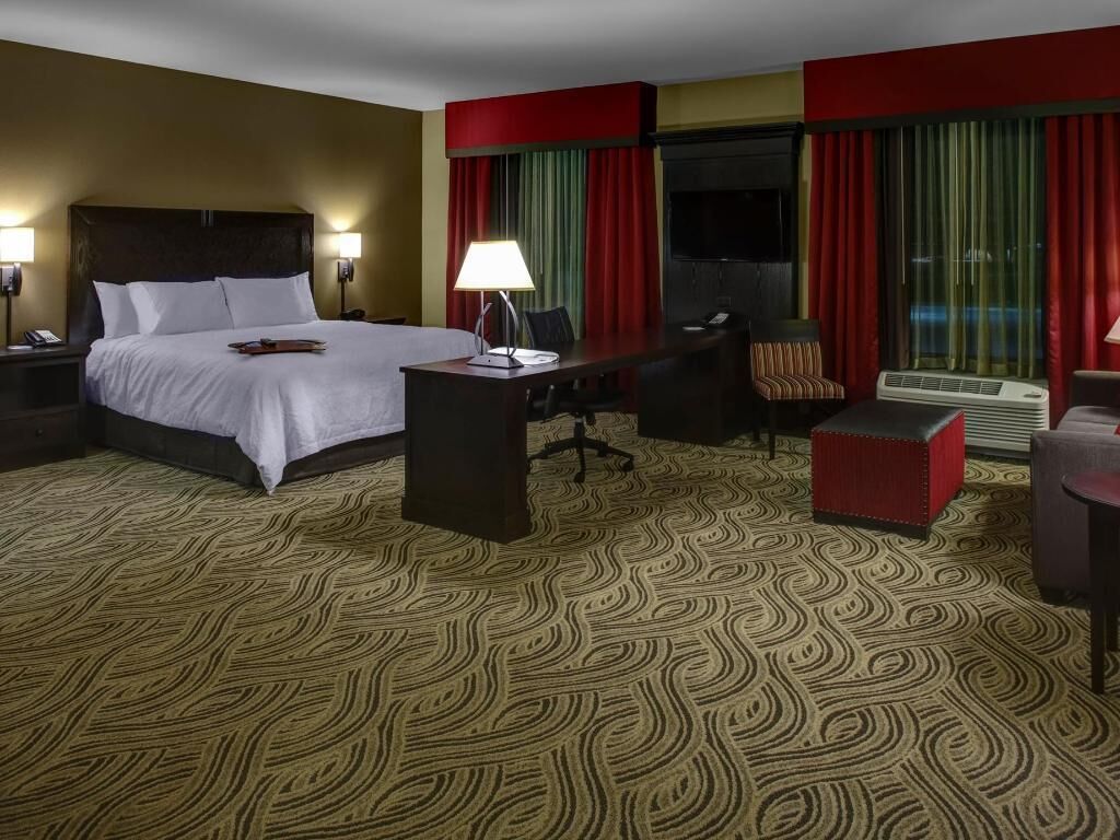 Hypo-allergenic bedding, pillowtop beds, desk, blackout drapes