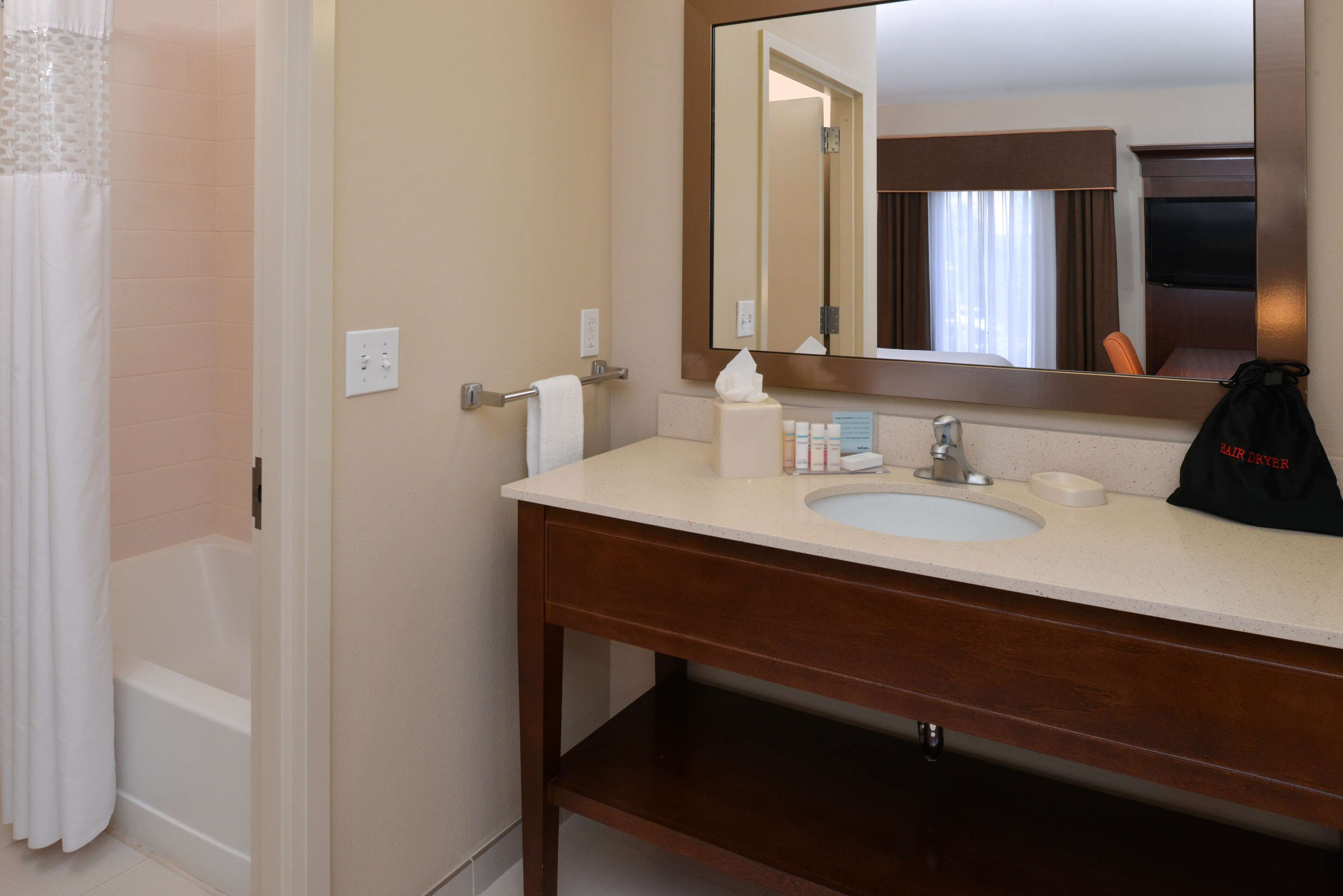 one king studio suite | bathroom | free toiletries, hair dryer, towels