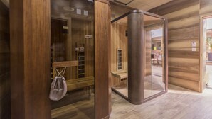 A modern interior with wooden paneling and glass partitions. - Hotel Lirak (Tetovo)