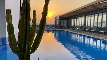 Outdoor pool, sun loungers