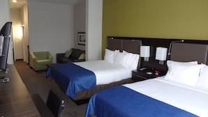 A hotel room with two beds, a desk, a chair, and a television. - Holiday Inn Express Hotel & Suites El Reno by IHG (El Reno)