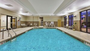 A swimming pool with clear blue water, a no diving sign, and a no swimming sign. - Hampton Inn Brockport, NY (Brockport)