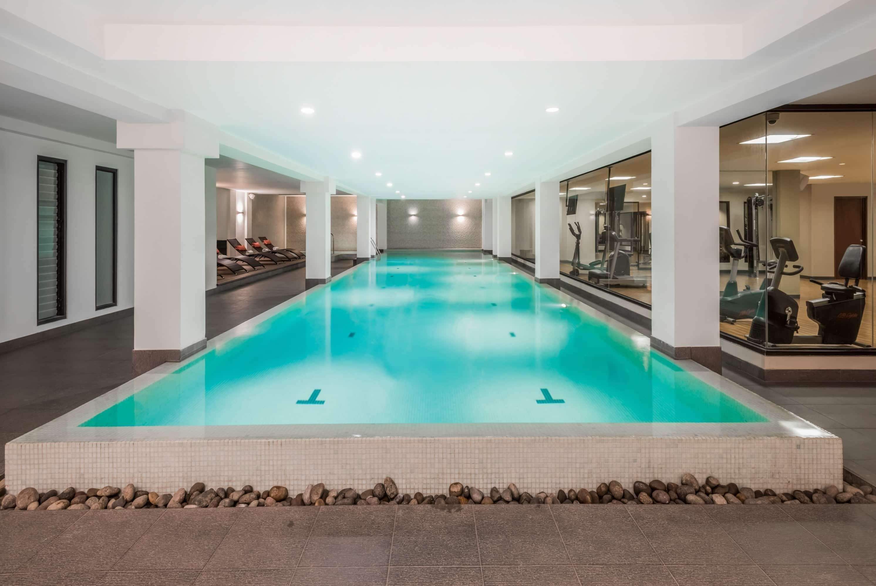 indoor pool, open 8:00 am to 10:00 pm, pool loungers