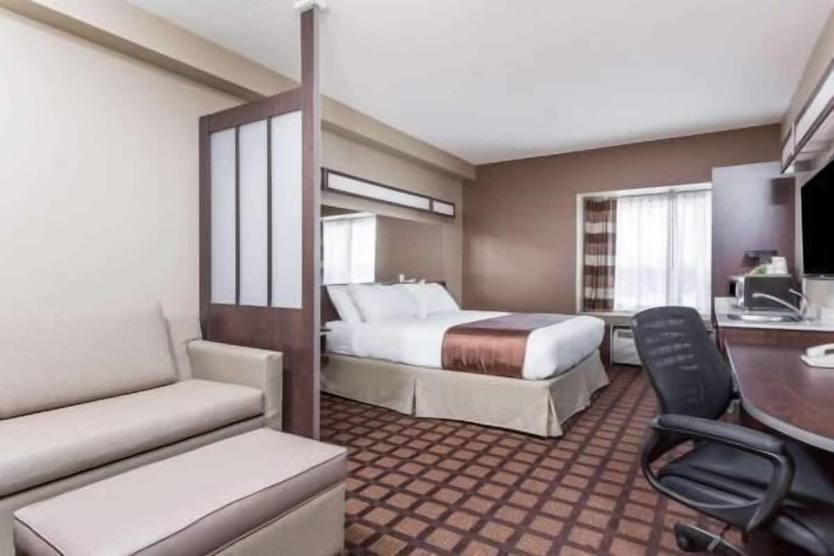 Desk, laptop workspace, iron/ironing board, rollaway beds