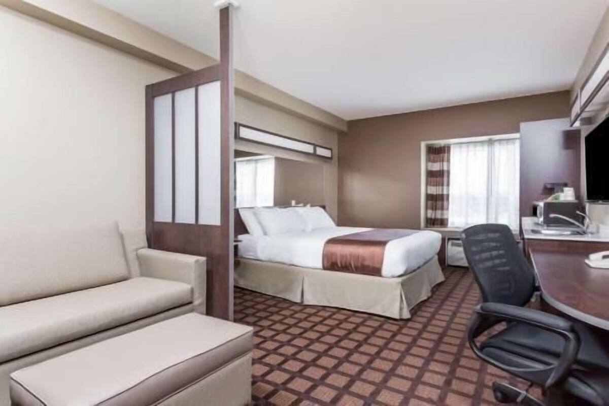 Desk, laptop workspace, iron/ironing board, rollaway beds