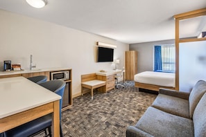 Suite, 1 cama Queen size, para no fumadores | Escritorio y espacio para trabajar con laptop