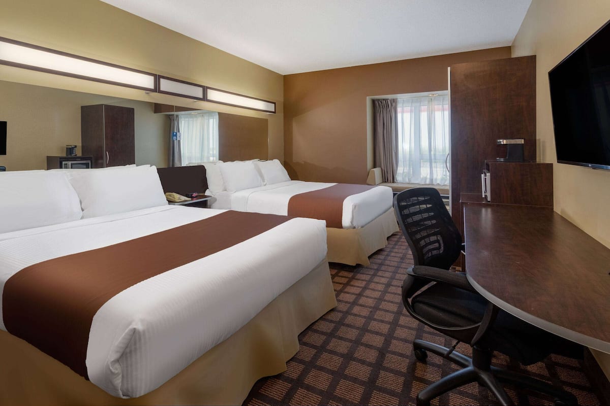 Standard Room, 2 Queen Beds, Non Smoking | Desk, laptop workspace, iron/ironing board, rollaway beds