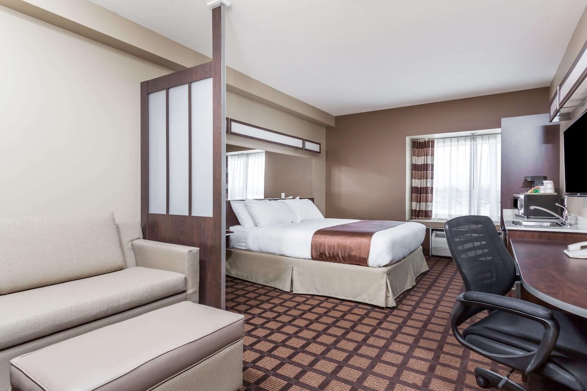Desk, laptop workspace, iron/ironing board, rollaway beds