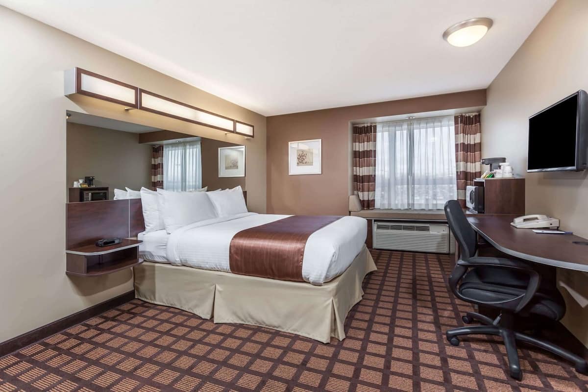 Desk, laptop workspace, iron/ironing board, rollaway beds