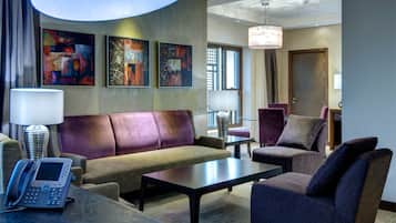 Suite, 4 Bedrooms, Non Smoking | Living area | 32-inch LCD TV with cable channels, TV, pay films