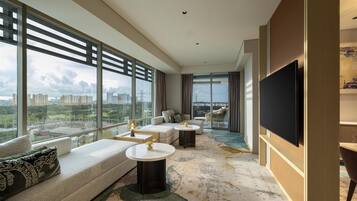 Premium Suite, 1 King Bed, Balcony | Living area | 55-inch TV with satellite channels