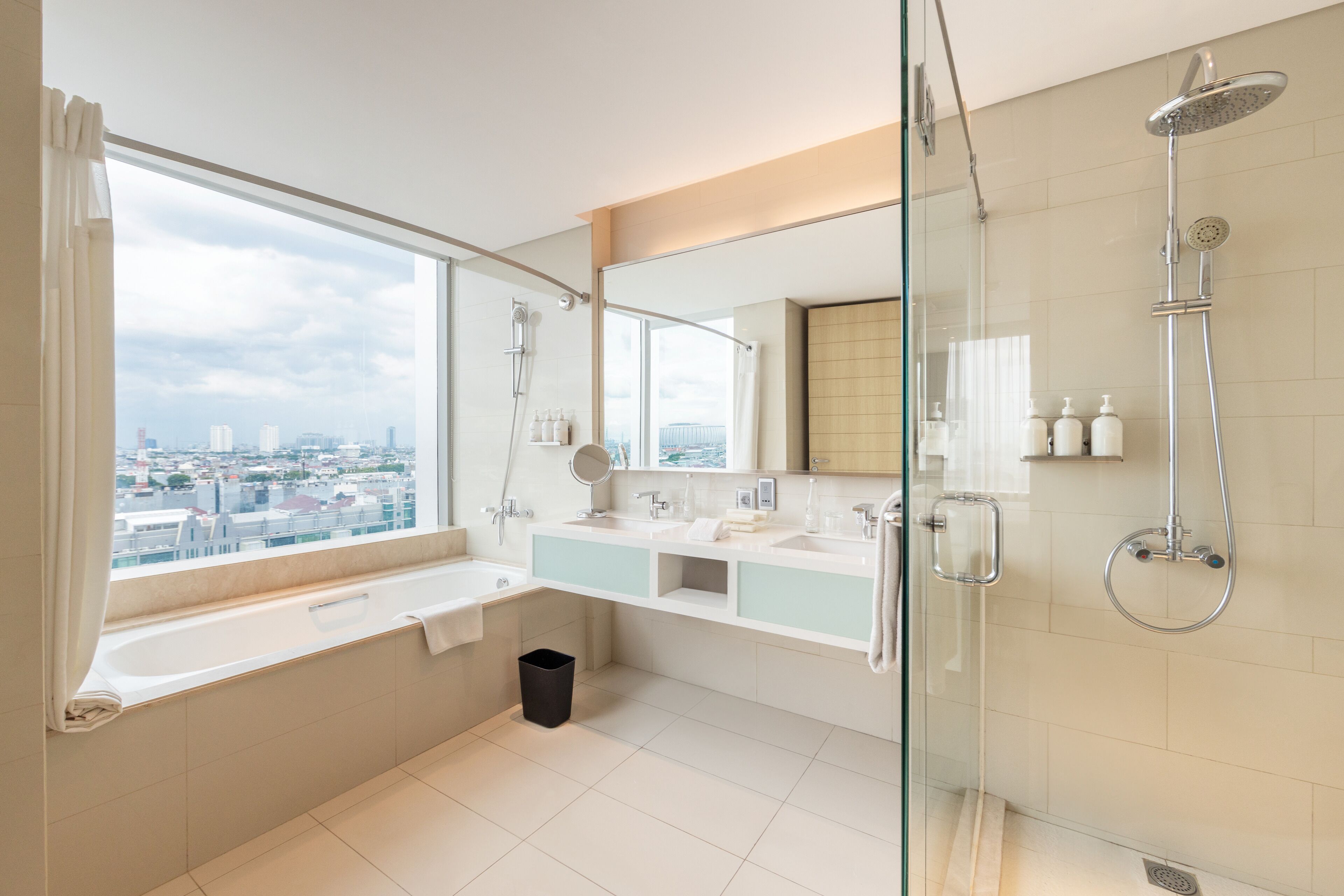 deluxe suite, 1 king bed | bathroom | free toiletries, hair dryer, slippers, bidet