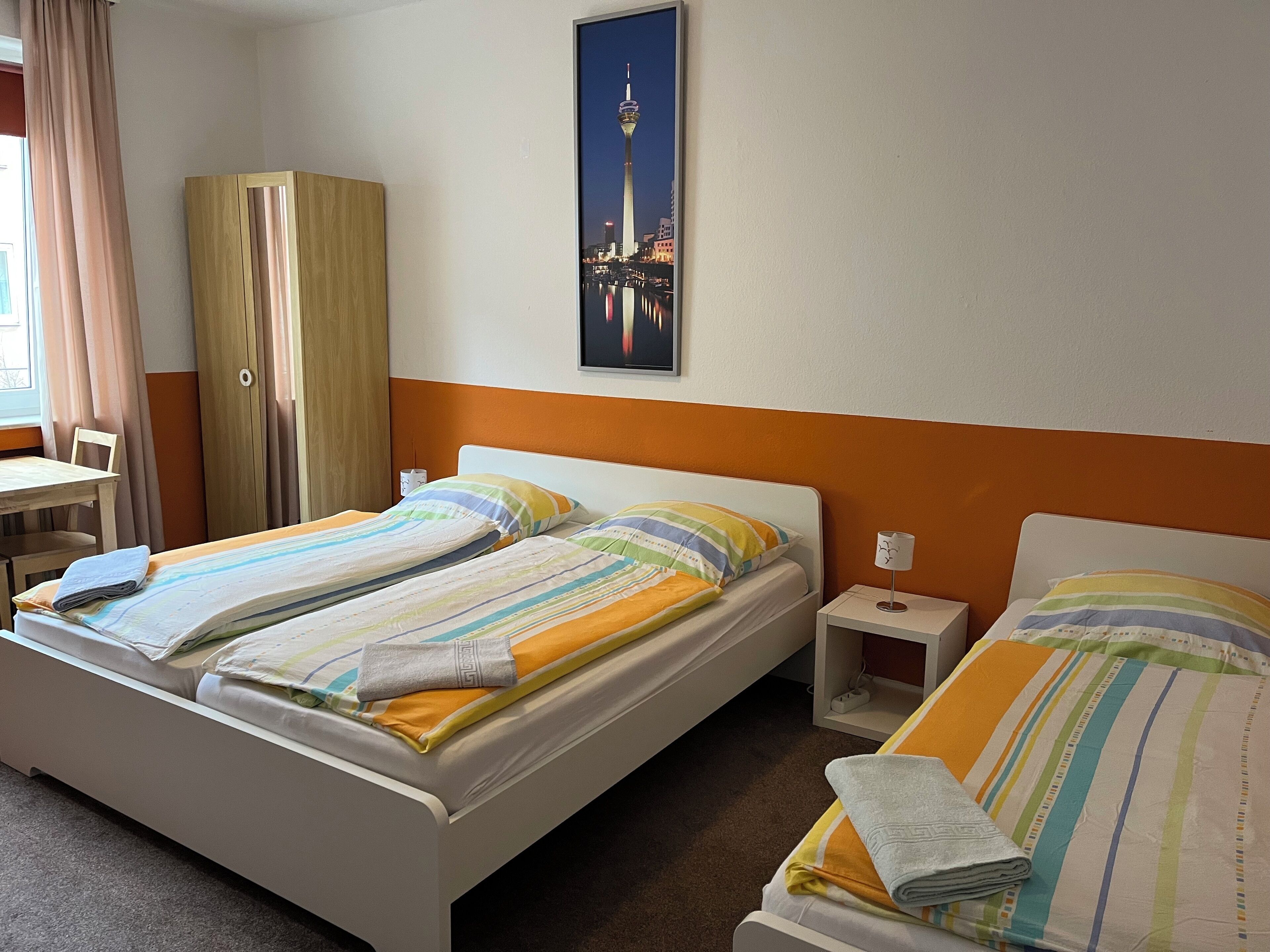 Triple Room, Non Smoking, Shared Bathroom