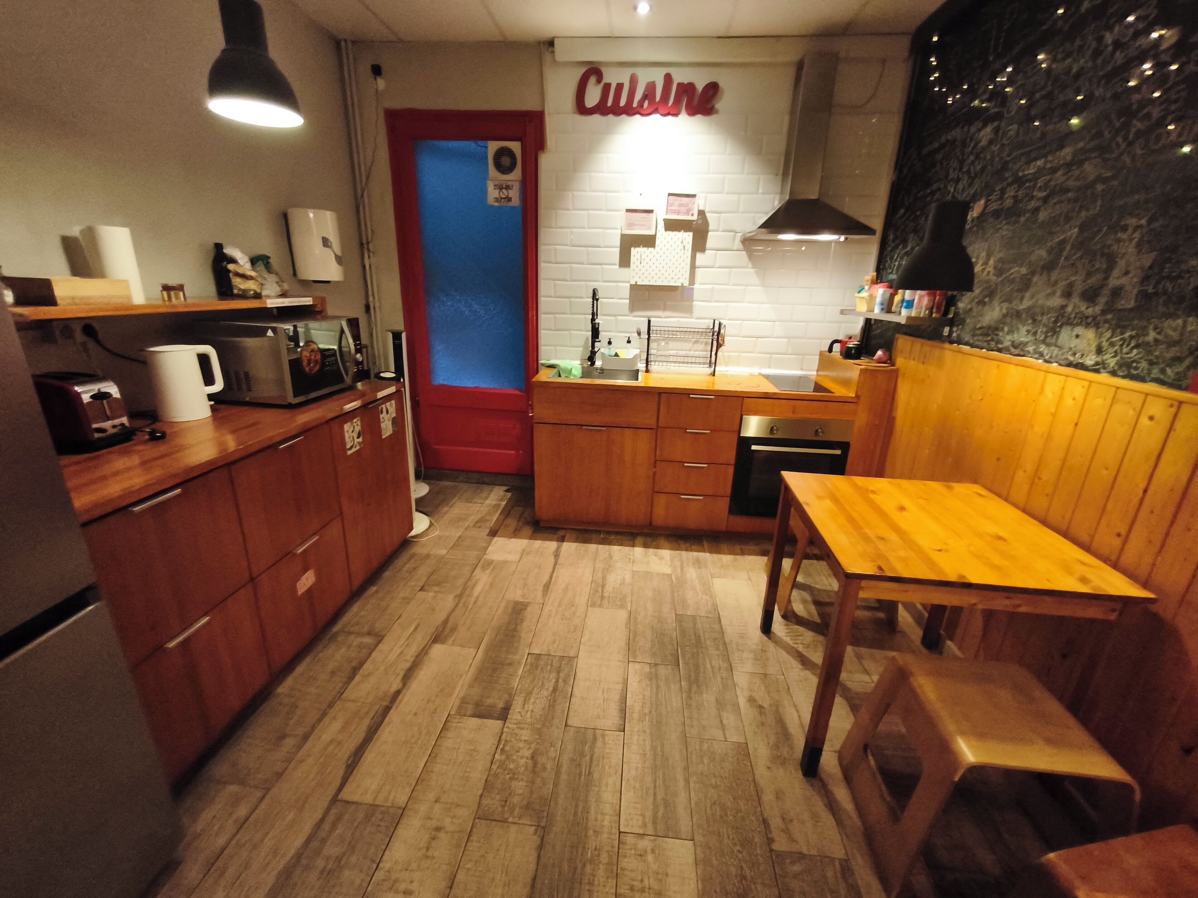 Familiekamer, gemeenschappelijke badkamer (with bunk beds) | Woonruimte