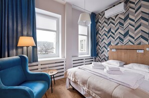 Desk, laptop workspace, blackout curtains, free WiFi