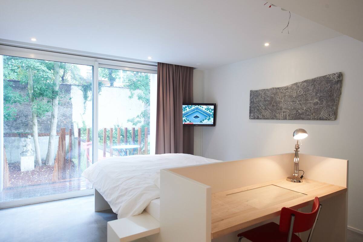 Loft Design, baignoire, vue jardin | Coin séjour