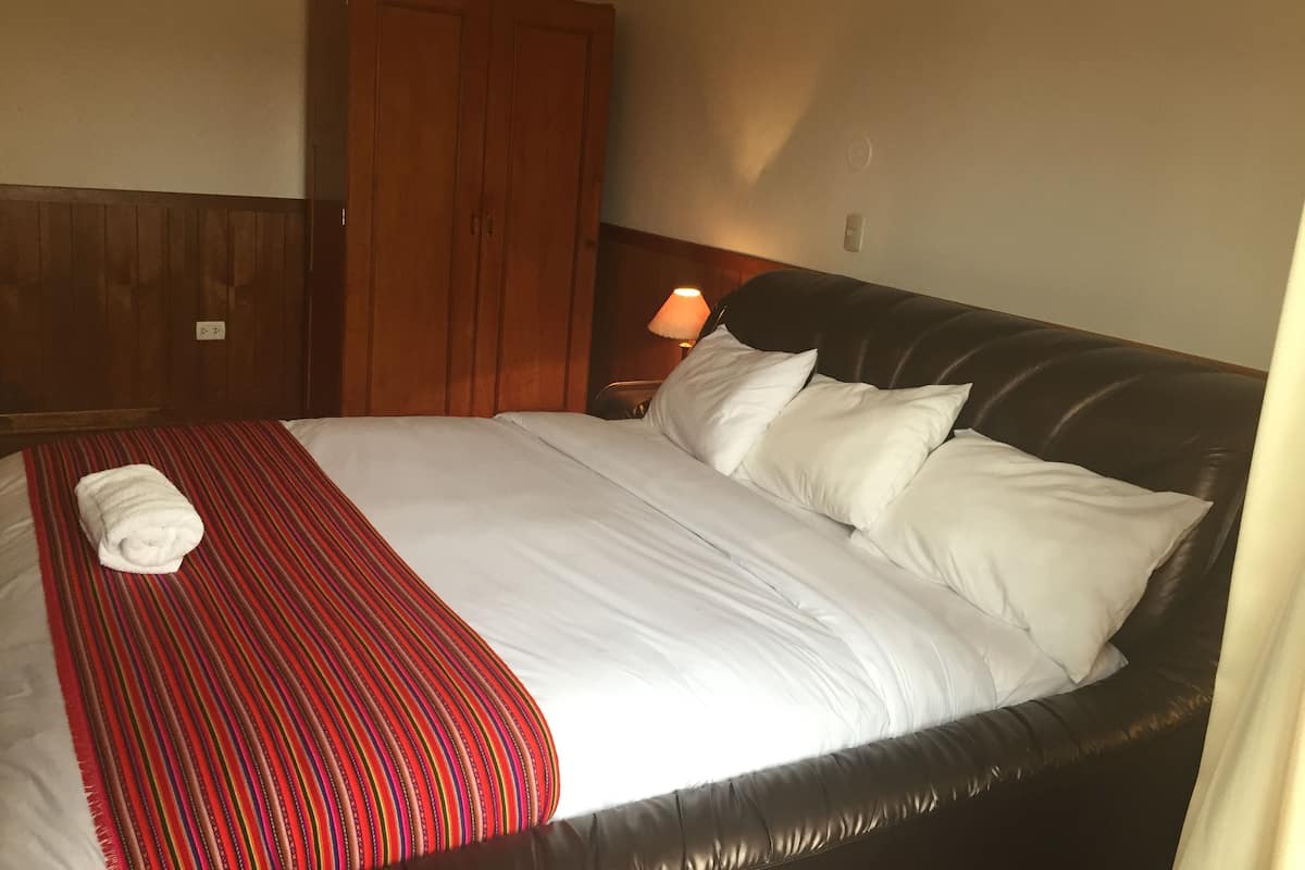 Family Room (Deluxe) | 1 bedroom, in-room safe, desk, free WiFi