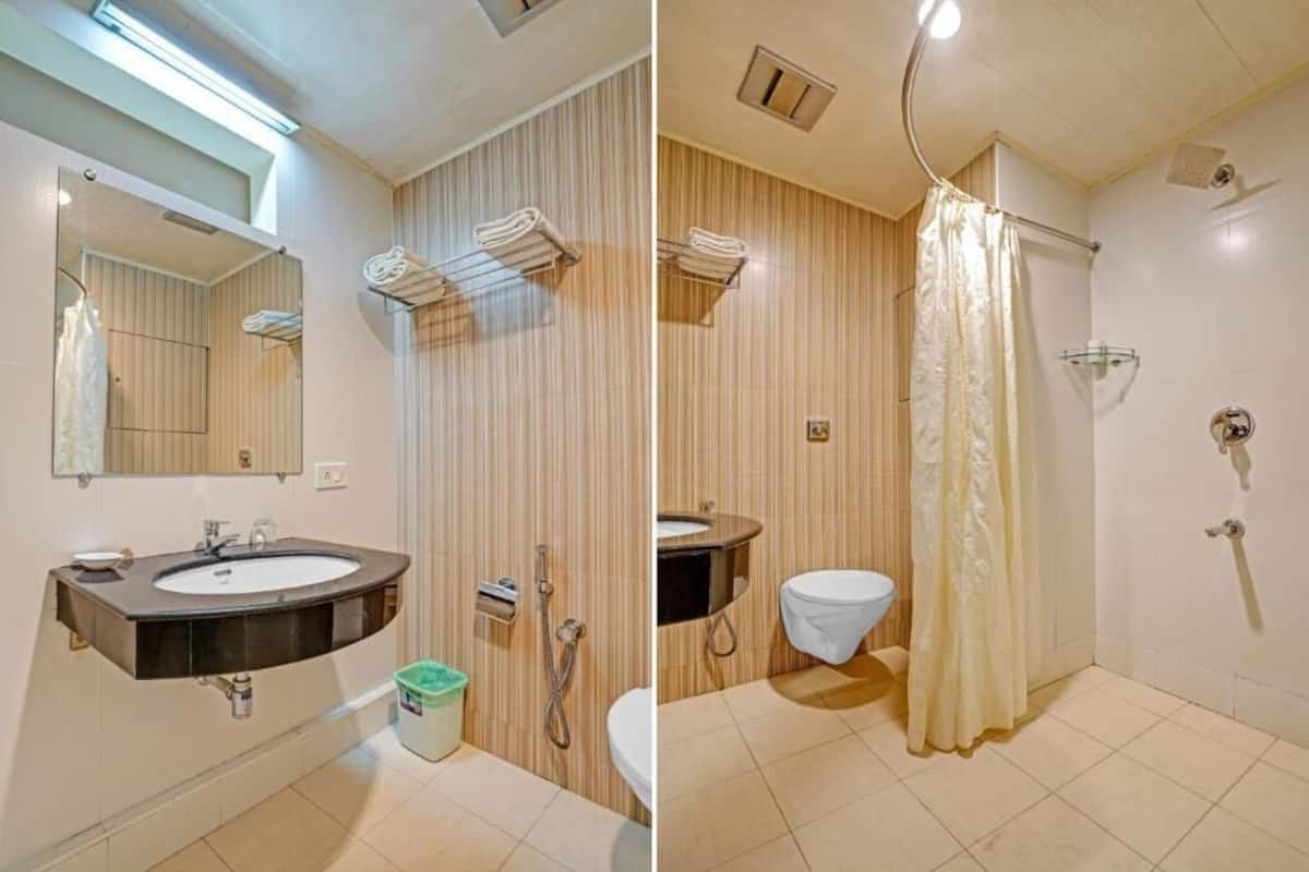 presidential double room, 1 king bed, garden view | bathroom | shower, rainfall showerhead, free toiletries, hair dryer