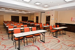 A conference room with multiple tables and chairs, carpeted floor, and ceiling lights. - Holiday Inn Express & Suites Columbus - Easton Area by IHG (Columbus)