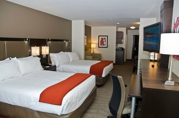 A hotel room with two beds, a desk, a chair, a TV, and a small kitchenette. - Holiday Inn Express & Suites Columbus - Easton Area by IHG (Columbus)