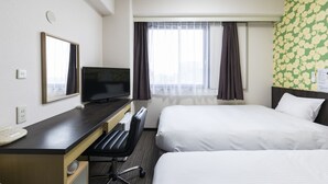 A hotel room with two beds, a desk with a television, a telephone, and a window with curtains. - KOKO STAY Kumamoto Yatsushiro (Yatsushiro)