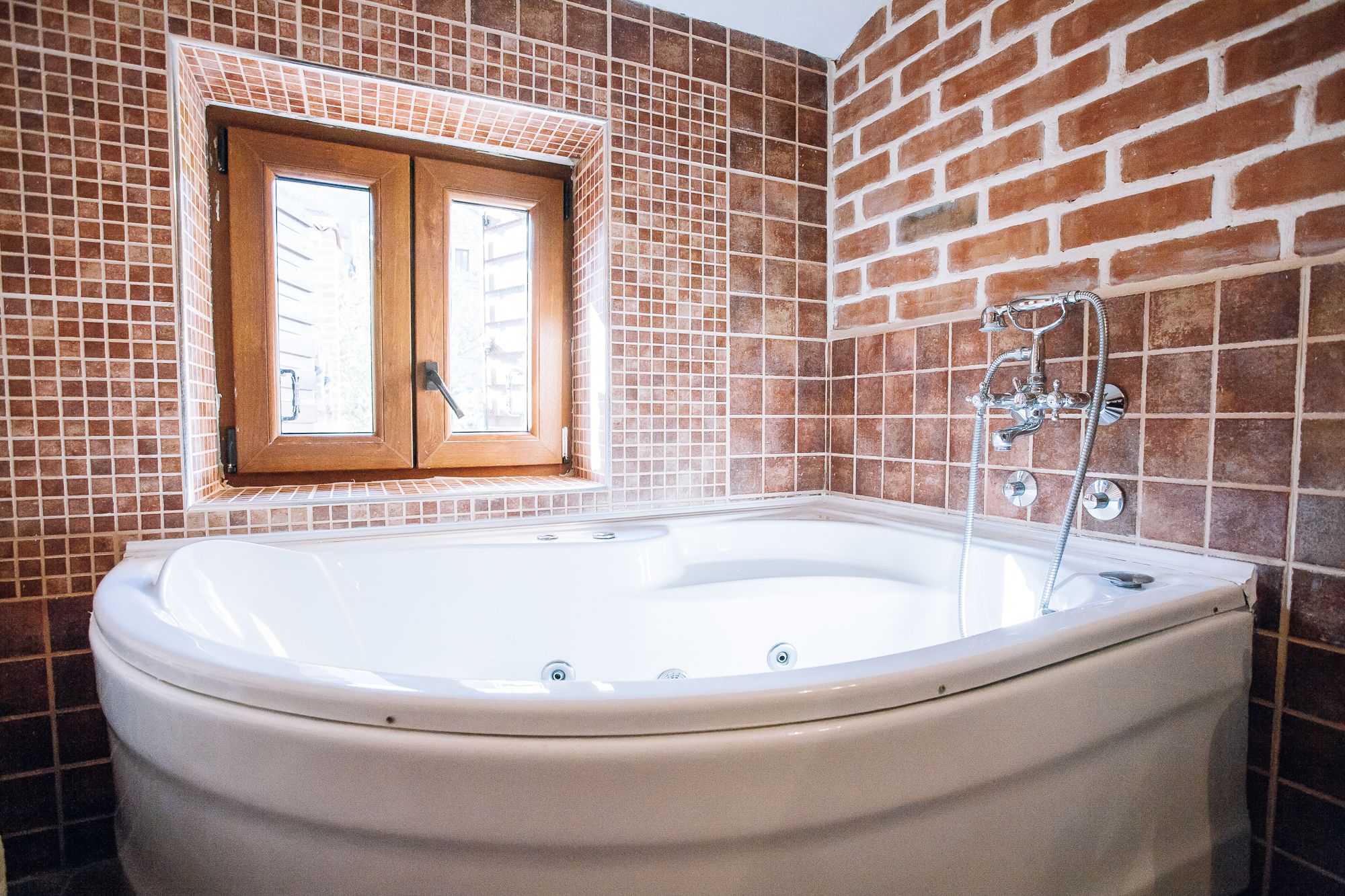 family suite, terrace | bathroom amenities | combined shower/bathtub, designer toiletries, hair dryer, bathrobes