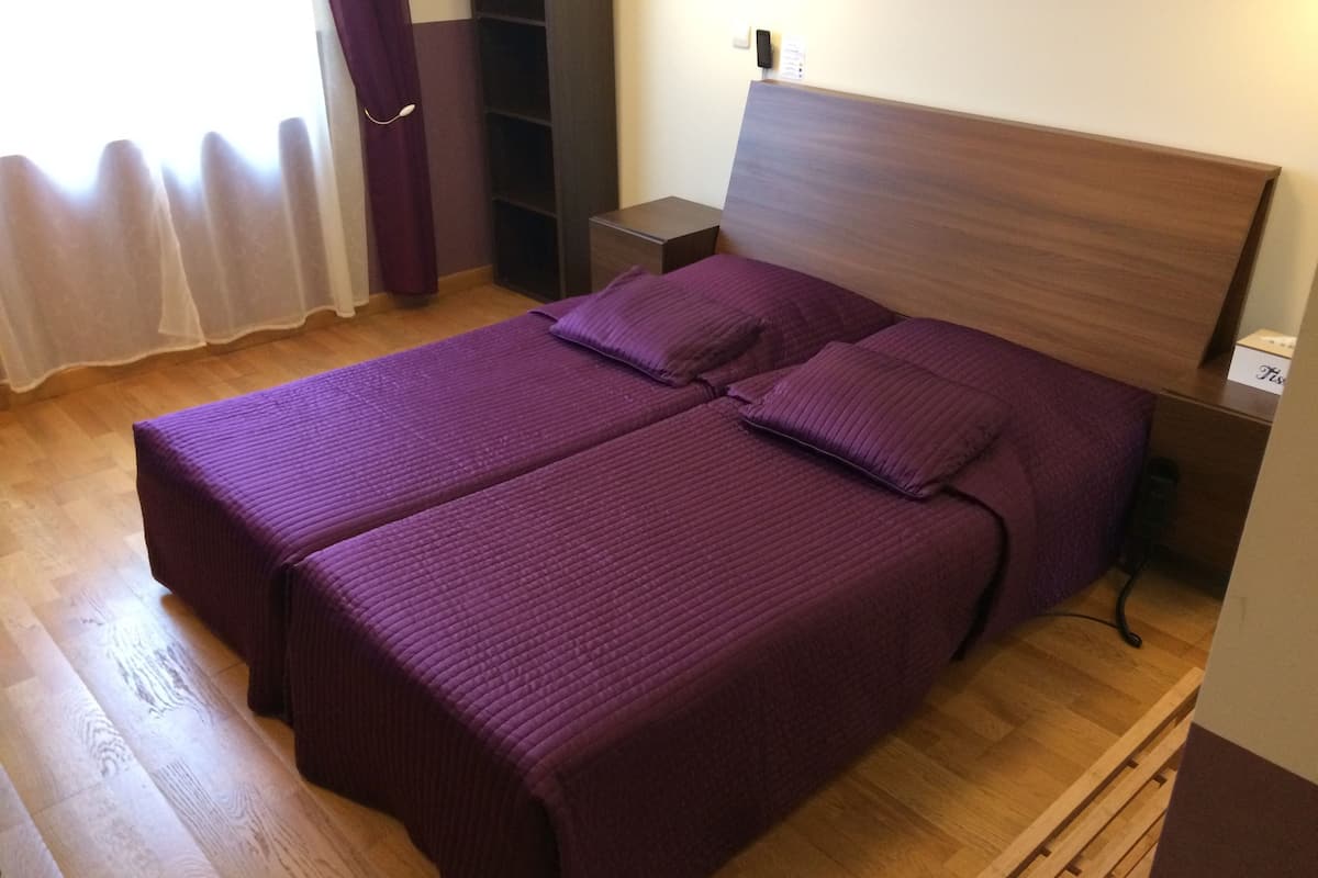 superior twin room, river view | pillow-top beds, individually furnished, desk, blackout curtains