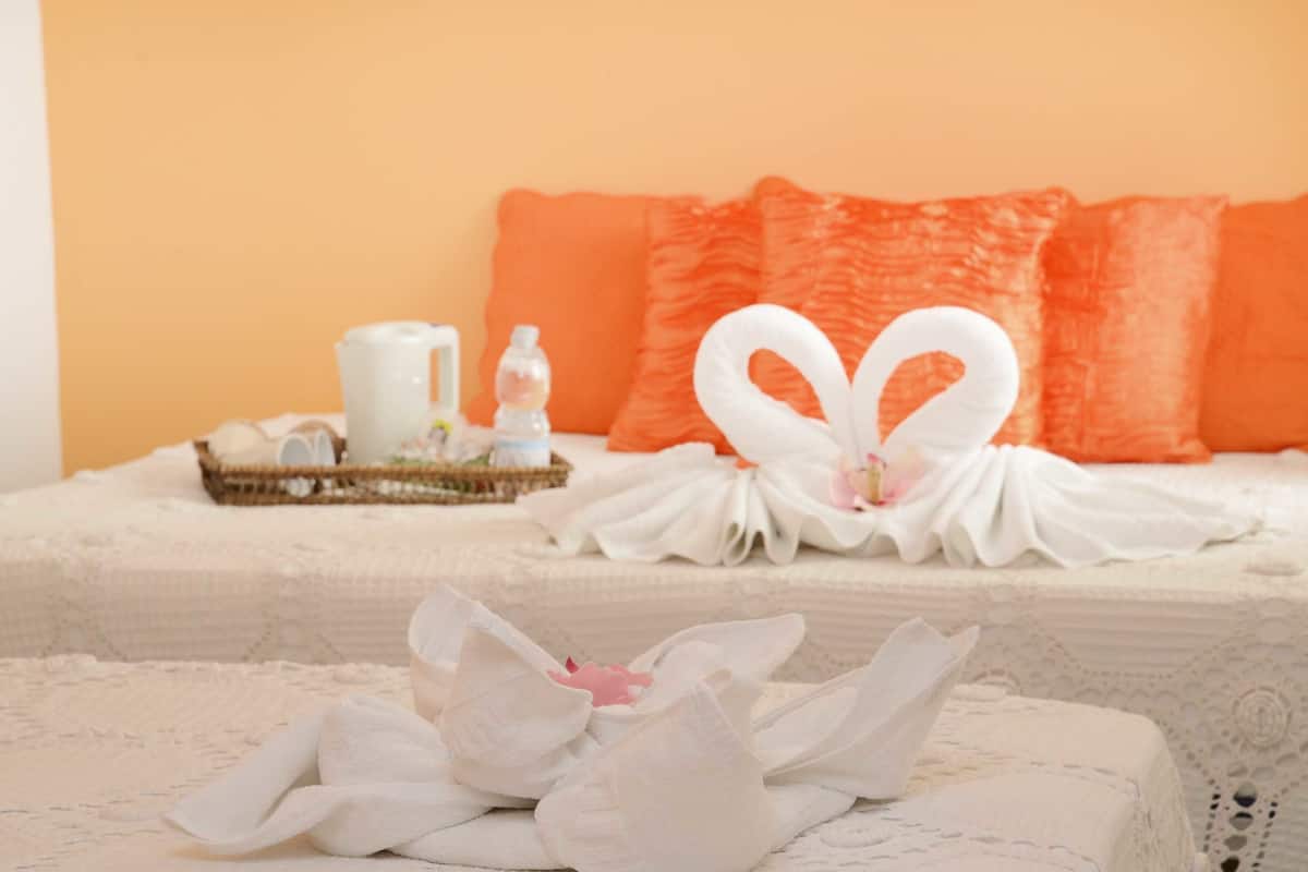 Quadruple Room, Shared Bathroom | Premium bedding, down comforters, in-room safe, individually furnished