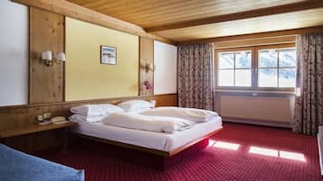 Coffres-forts dans les chambres, bureau, draps fournis