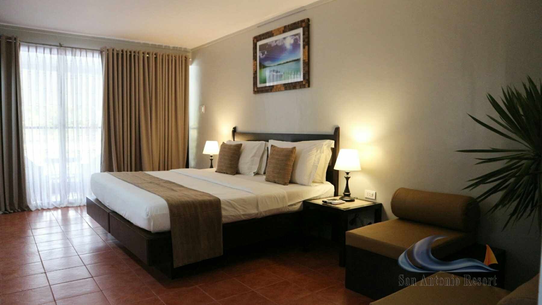 Suíte, vista para a lagoa | Cortinas blackout, roupa de cama