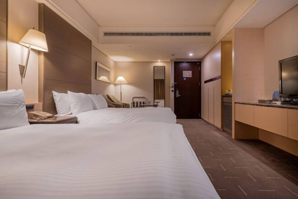 Down comforters, desk, laptop workspace, blackout drapes