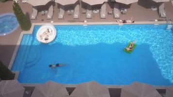 Indoor pool, 2 outdoor pools, open 10 AM to 9:00 PM, free cabanas