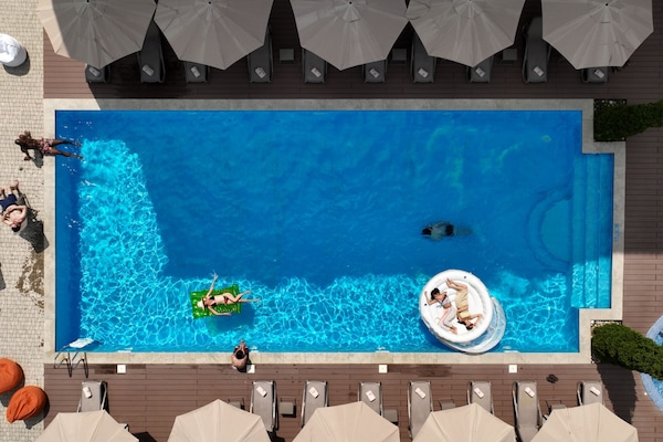 Indoor pool, 2 outdoor pools, open 10 AM to 9:00 PM, free cabanas